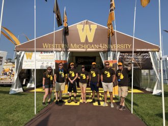 WMU Aviation Alumna Reina Cooke while working at EAA AirVenture in Oshkosh, Wisconsin