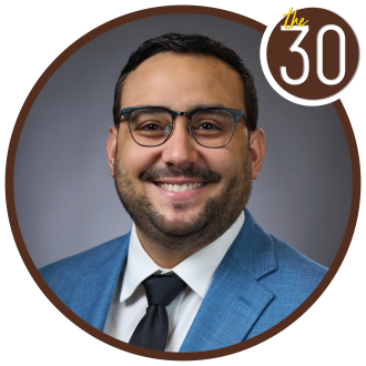 Jose Cardona in a Blue suit