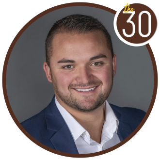 Jordan Chopp in a suit and tie 