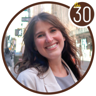 Sarah Obermeyer, B.B.A.’22 in front of a cityscape