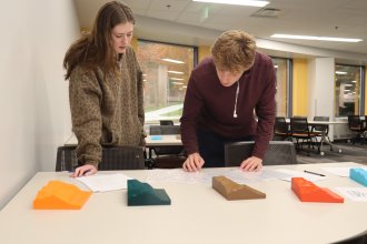 Students examined 3D-printed models of Mount Etna before using the VR application. 