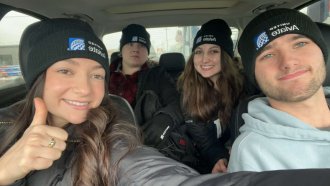 Group of students in a car for an idustry visit to United.
