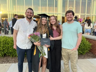 Students and family at highschool graduation.