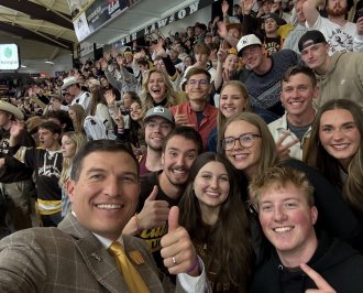 students attending a western hockey game.