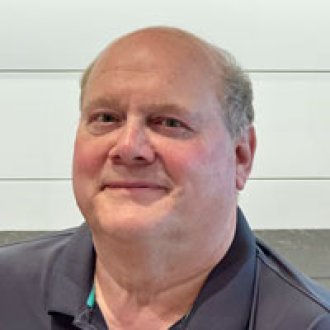 Coating Course Speaker Herb Kohler is looking at the camera.