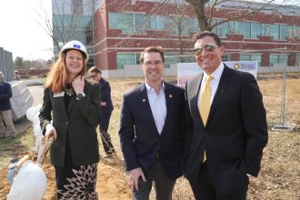 Dean Karla Koretsky, Sen. Sean McCann and WMU President Russ Kavalhuna.
