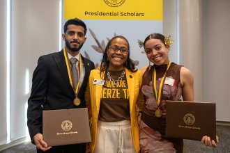 At the Presidential Scholars 2026 celebration are Dr. Luchara Wallace and dance recipient Arise Rock.