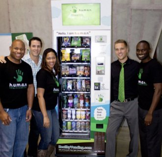 CEOs Randall Rochon, Sharmain Moulton and Ahmed Moulton with their Vending Franchise 