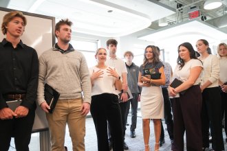 Cadelyn Takace addresses her classmates