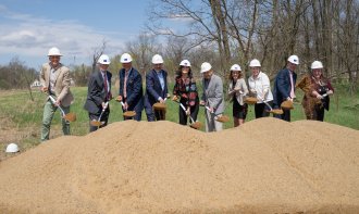 Groundbreaking ceremony -- people with shovels and hard hats