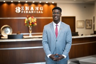 Mo Tall, a personal financial planning student, is interning at Zhang Financial.