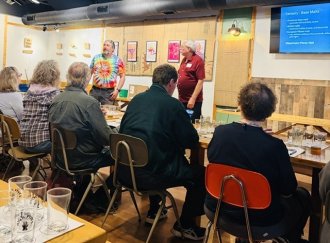 OLLI instructor teaching an OLLI class at One Well Brewery