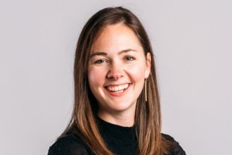 Adrienne Fraaza wearing a black sweater