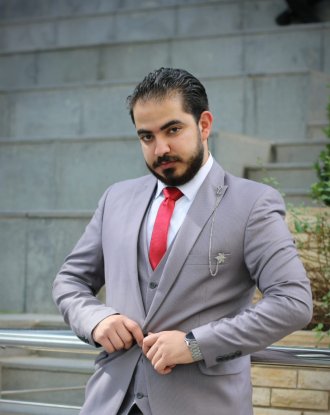 An international student from Jordan poses during graduation season.