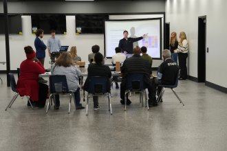 WMU Haworth students present an employee scheduling proposal to Douglas Community Association staff during a final project presentation in spring 2026.