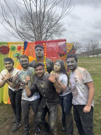 An international student celebrates Holi on WMU's campus.
