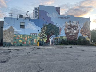 Mural Painted on side of Building of a Person