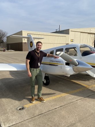 WMU Aviation Alumni Joe Zynda with the WMU Piper Seminole