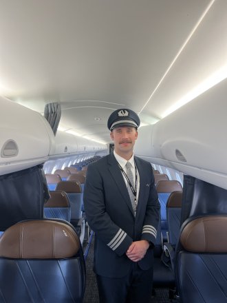 WMU Aviation Alumni Joe Zynda in his pilot uniform