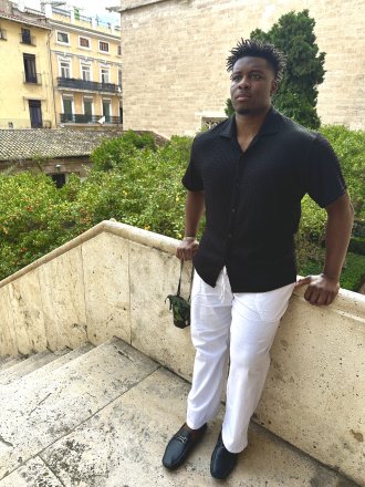 WMU study abroad student, Jori Benson, stands at the top of stairs in Spain.
