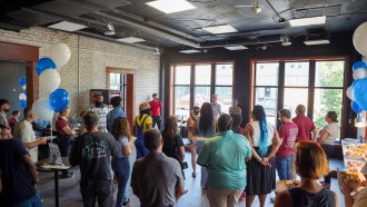 Business owners gather at an event.