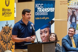 Chad Singleterry speaks at a podium.