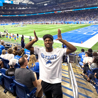 Student at football game.