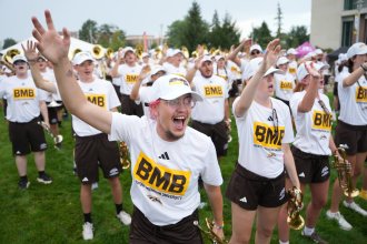 Bronco Marching Band members cheer during Bronco Bash.