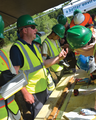 Tom Howe working at a hydrology camp
