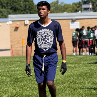 Student in a flag football game.