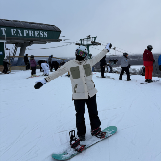 Student snowboarding.