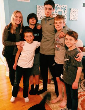 A female student with her five younger siblings