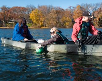 People in a boat on a lake