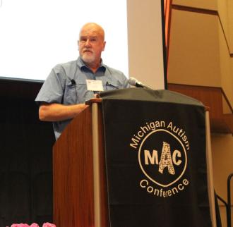 Dr. Alan Poling presenting at the Michigan Autism Conference in Kalamazoo, Michigan