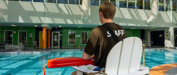 SRC lifeguard patrolling the pool