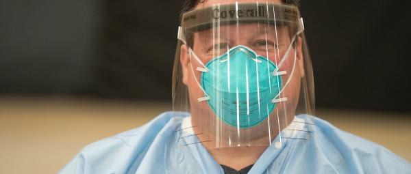 Doctor in N95 mask with face shield