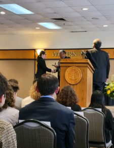 Morgan Boyd receiving the WMU Presidential Scholar Award with President Montgomery