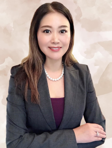 Professional photo of Guili Zhang in a grey suit