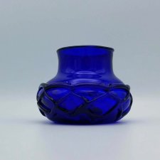 Blue glass beaker. 