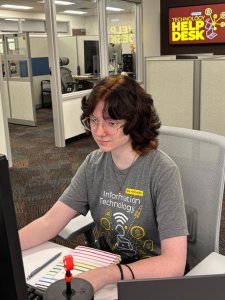Hannah Craft working at the Technology Help Desk, as a student tech, in the University Computing Center