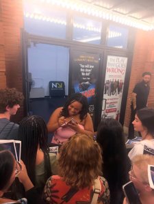 Aniya Thompson at the backstage door to Heathers the Musical in New York City signing autographs.