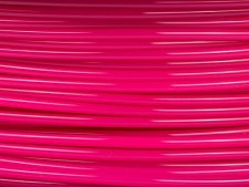 Magenta filament for a 3D printer.