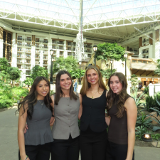 Students in front of hanging gardens.