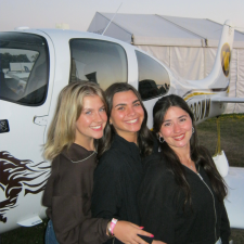 Students in front of plane.